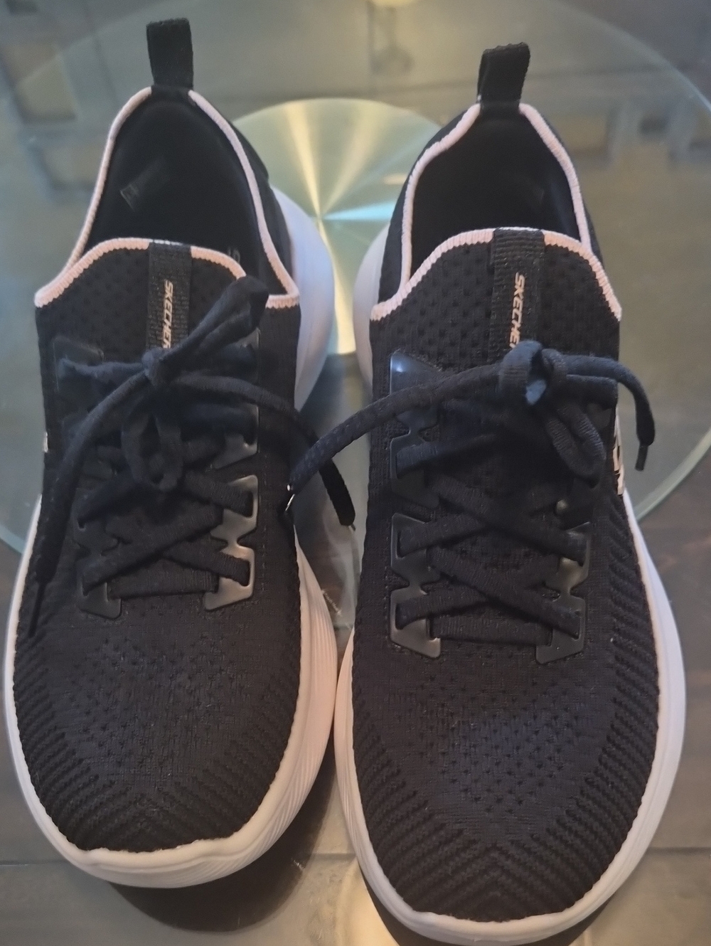 Skechers Black Knit Slip-On Sneakers with Light Pink Trim and White Sole
